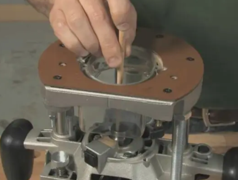 Checking router bit runout and collet seating with a gauge